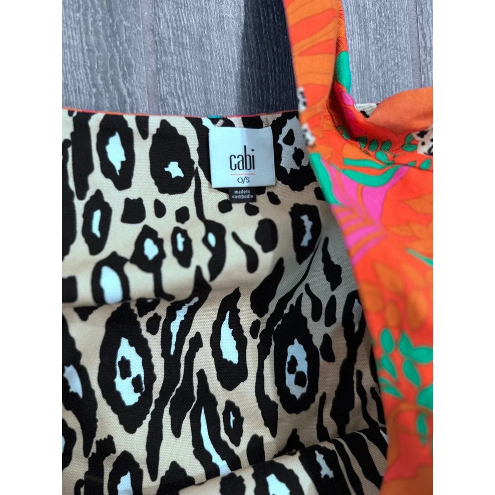 CAbi Sling‎ Bag  Reversible with Animal Print/Orange with Palm Leaf Print